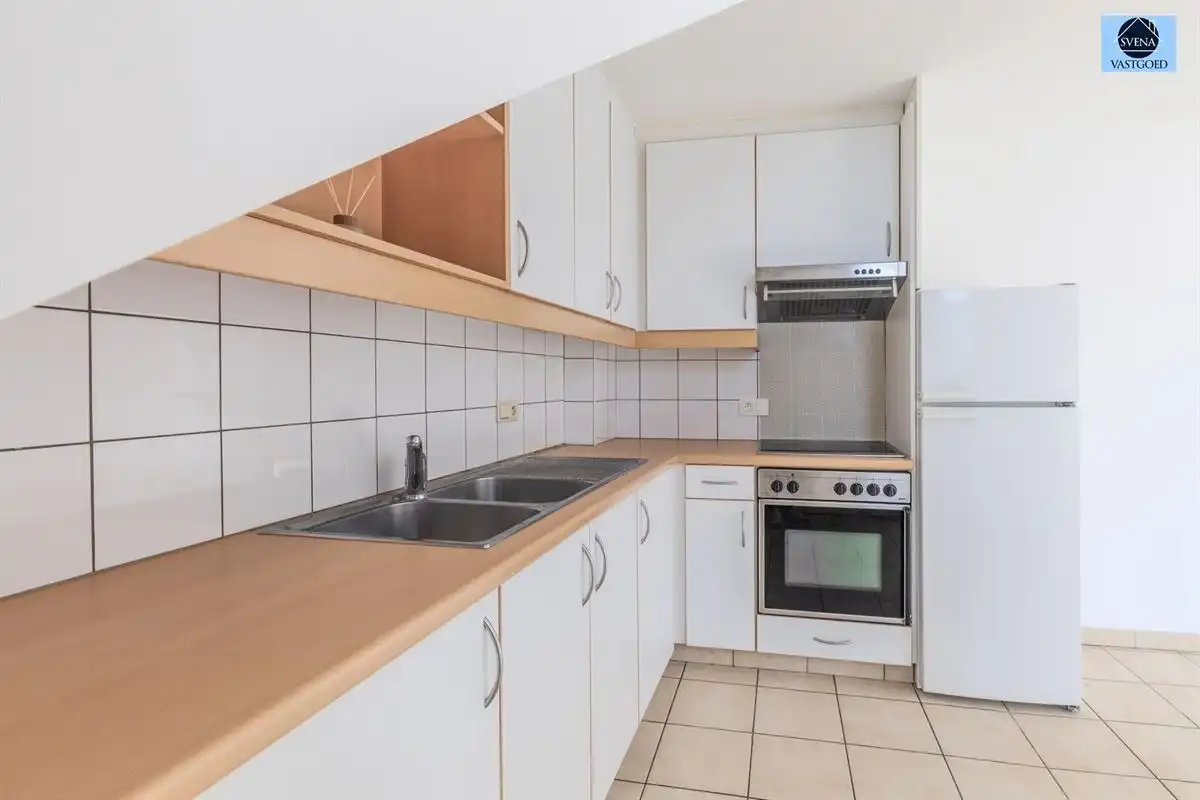 LICHTRIJK APPARTEMENT MET 2 SLAAPKAMERS IN CENTRUM GERAARDSBERGEN foto {{pictureIndex}}