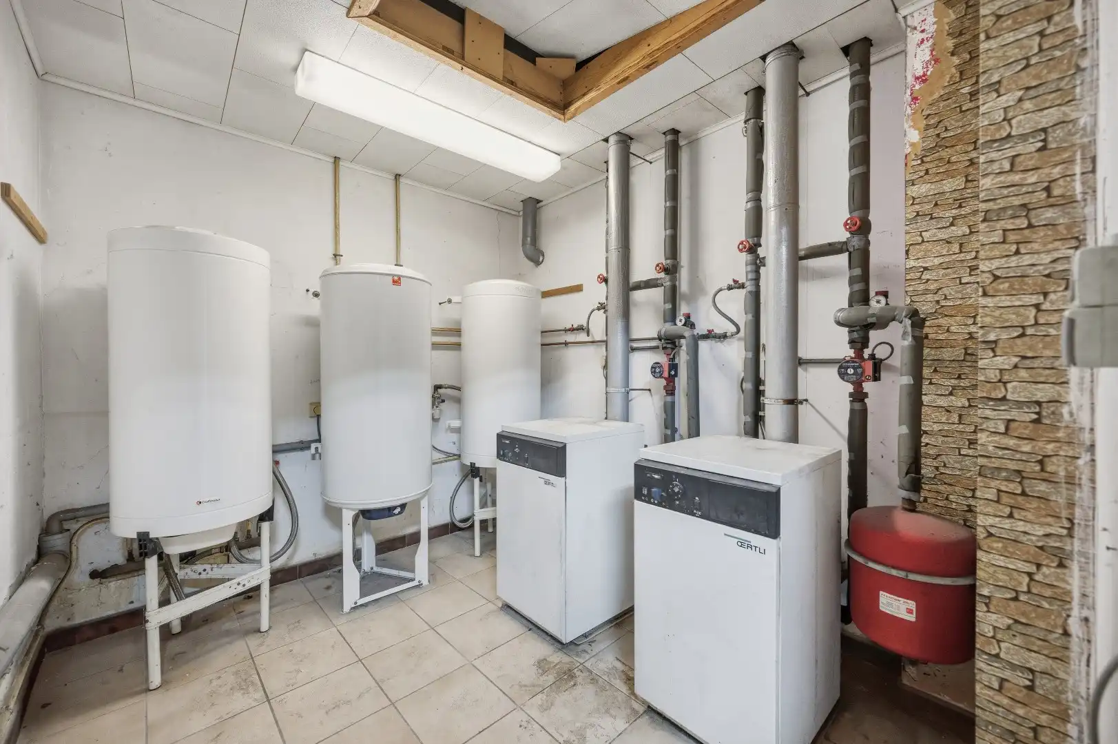 1 rijwoning en 2 appartementen in gezellig Hoegaarden foto 9