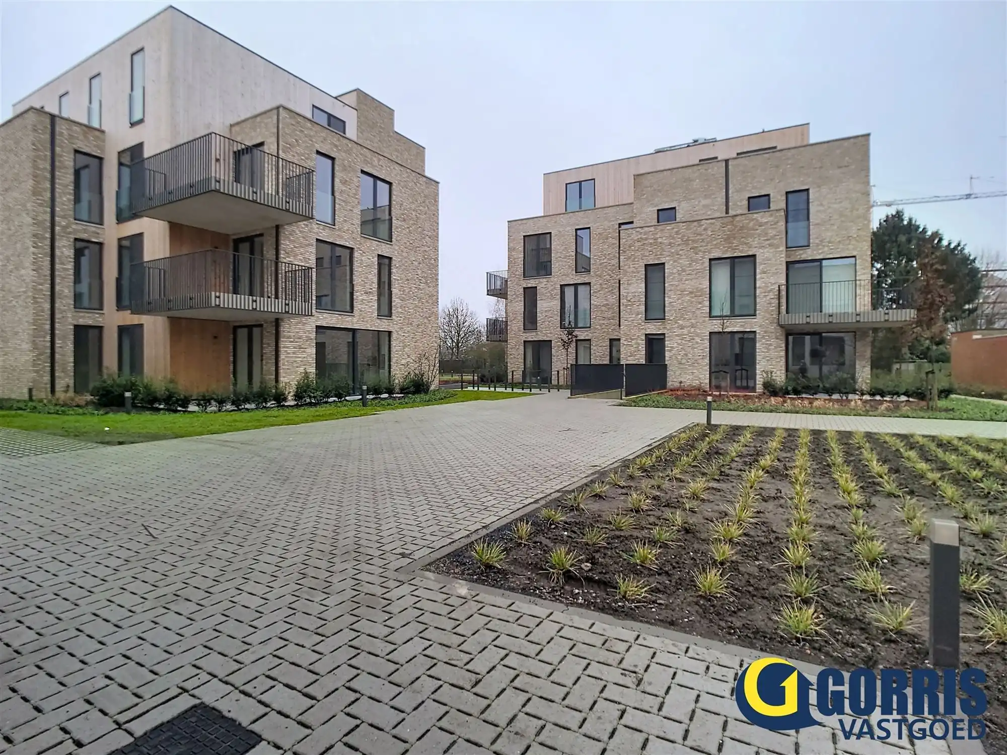 Rustig gelegen gelijkvloers nieuwbouwappartement met 2 slaapkamers. foto {{pictureIndex}}