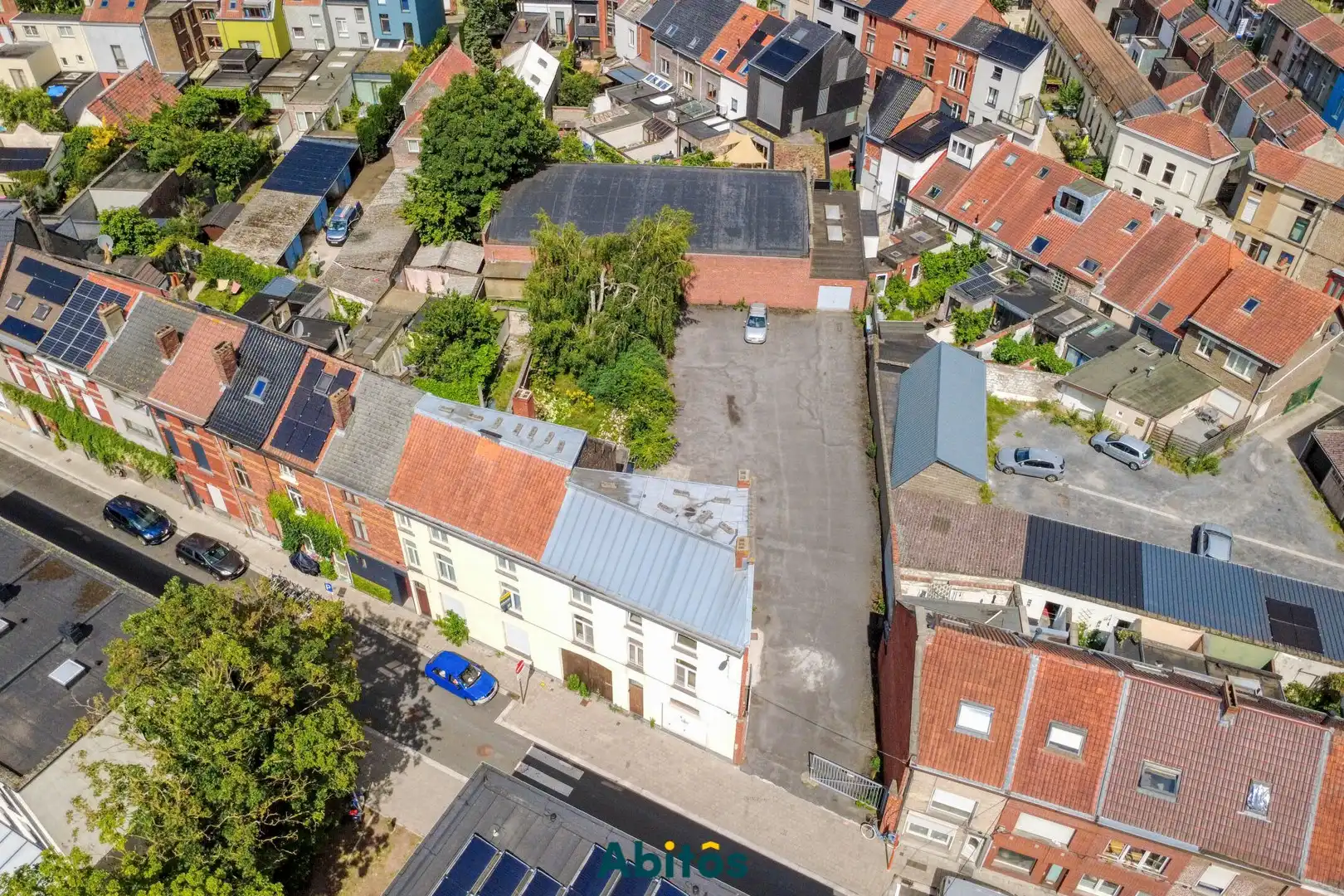 Opbrengsteigendom met 2 woningen, loods en garage in Gent foto 2