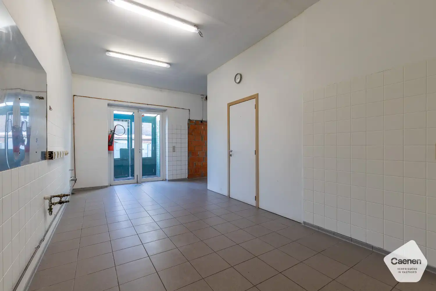GOED GELEGEN HANDELSWONING IN HET CENTRUM VAN ASSEBROEK foto 6