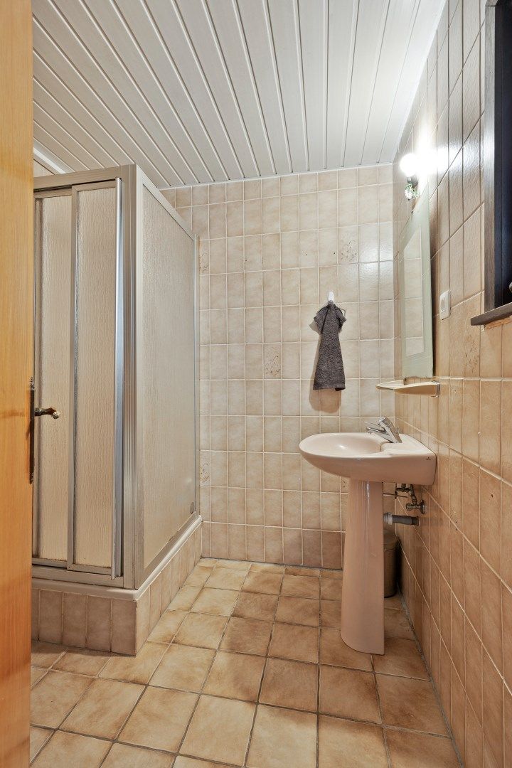 Te renoveren woning nabij het centrum van Mol ! foto 16