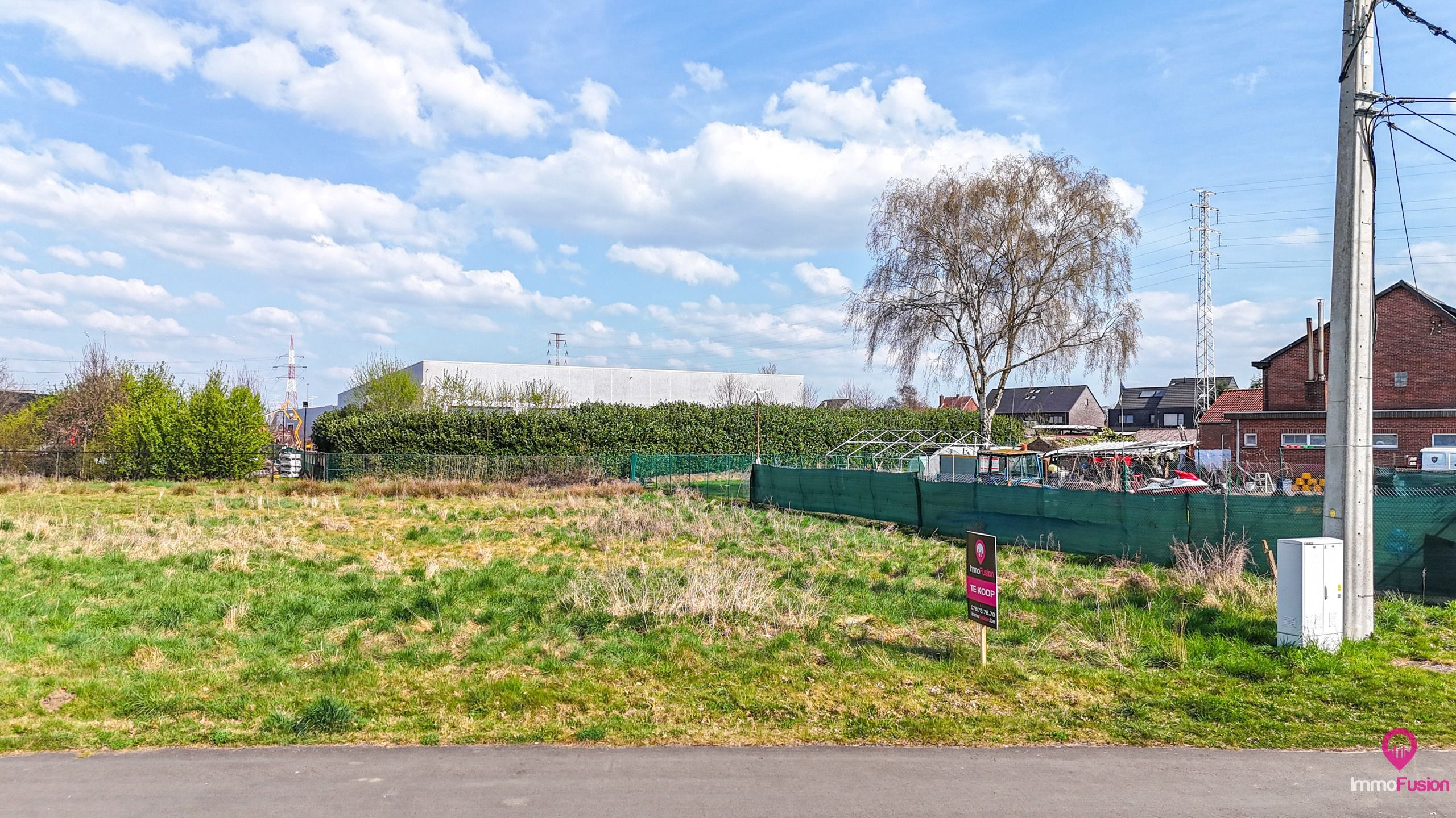 Centraal gelegen bouwgrond voor open bebouwing in Paal! foto 5