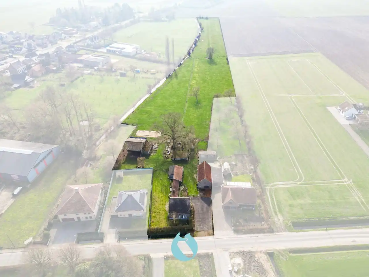 Hoofdfoto van de publicatie: Te renoveren hoeve op unieke ligging (perceel 19.617m²)