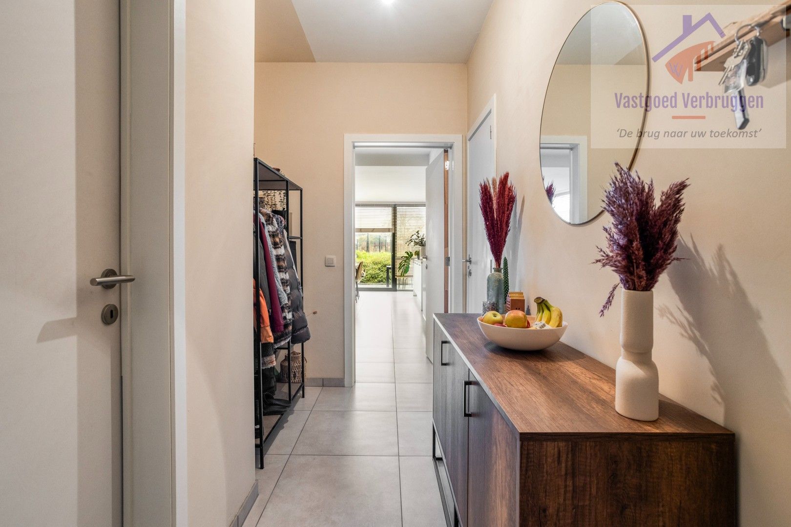 Recent gelijkvloers appartement met terras en tuin foto 3