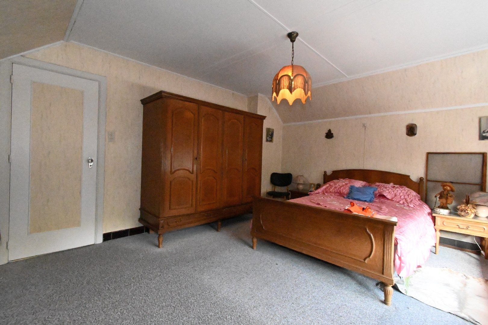 Alleenstaande woning met carport en tuin foto 22
