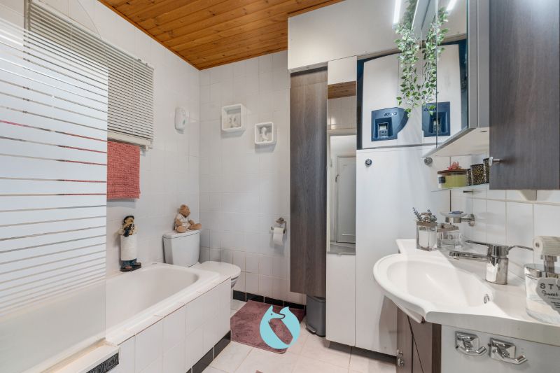 Rustig gelegen appartement met 2 slpks, tuin en garage foto 4