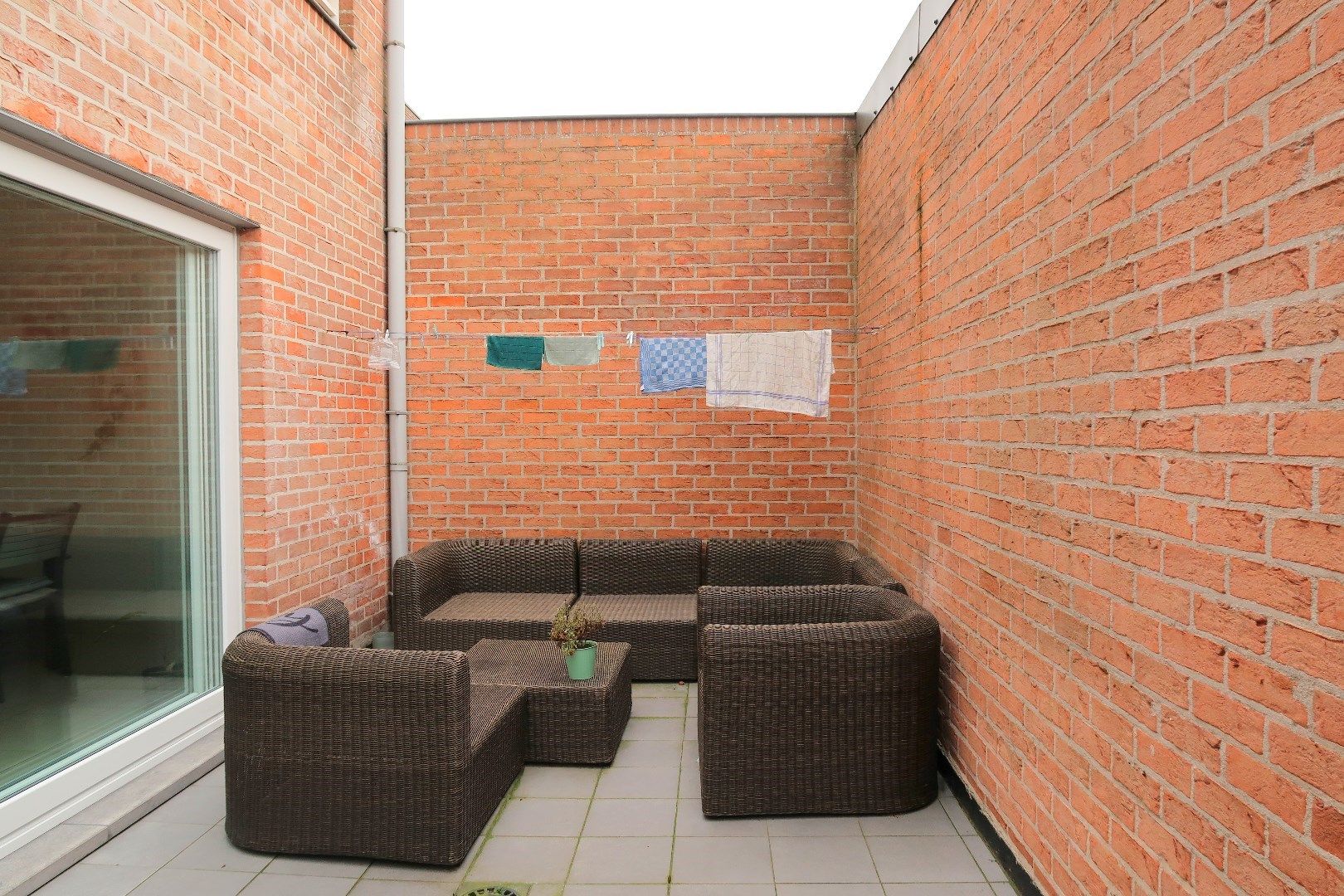 Opbrengsteigendom met 3 appartementen en 3 garageboxen. Ideale investering! foto 5