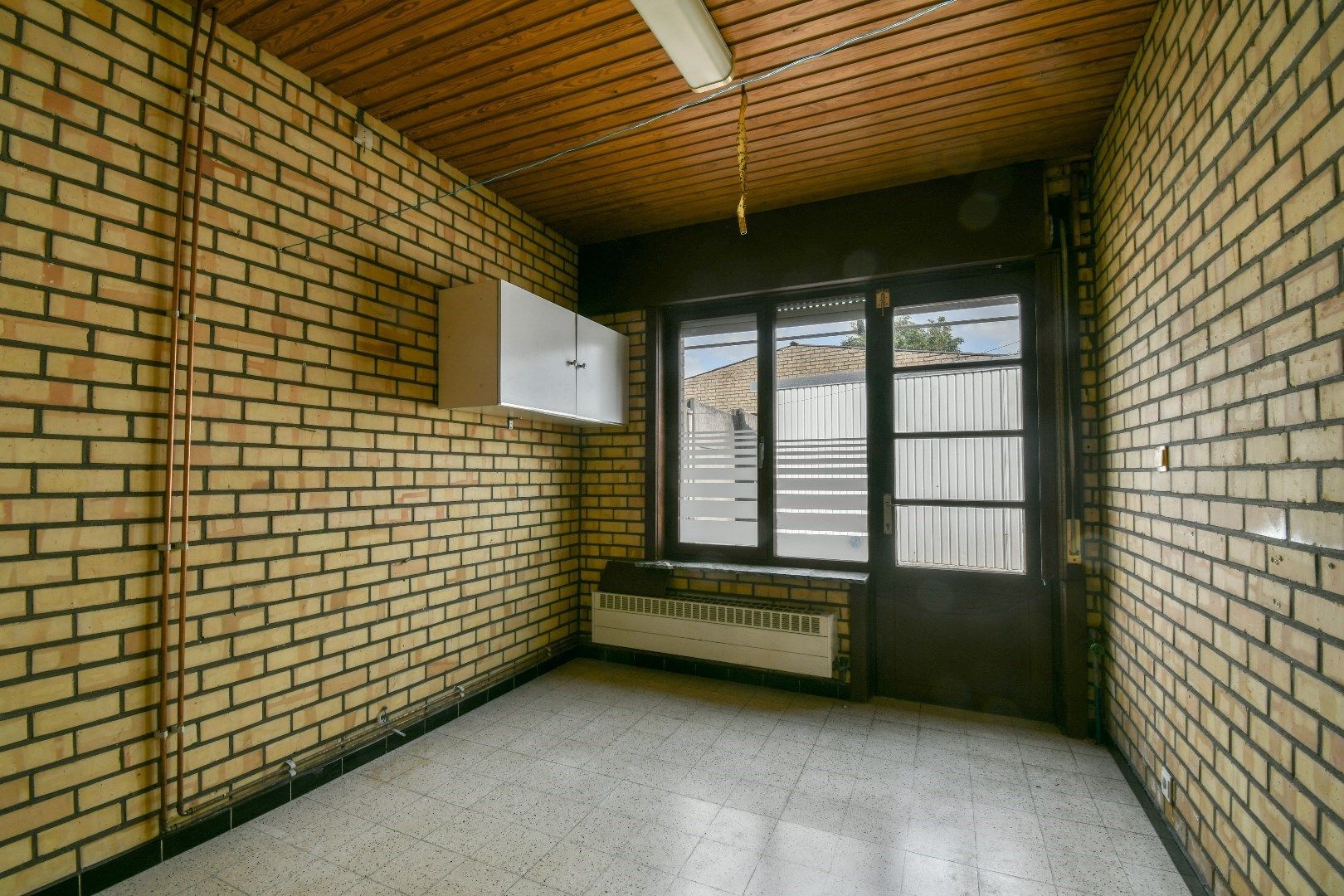 Halfopen bebouwing met renovatiepotentieel! foto 8