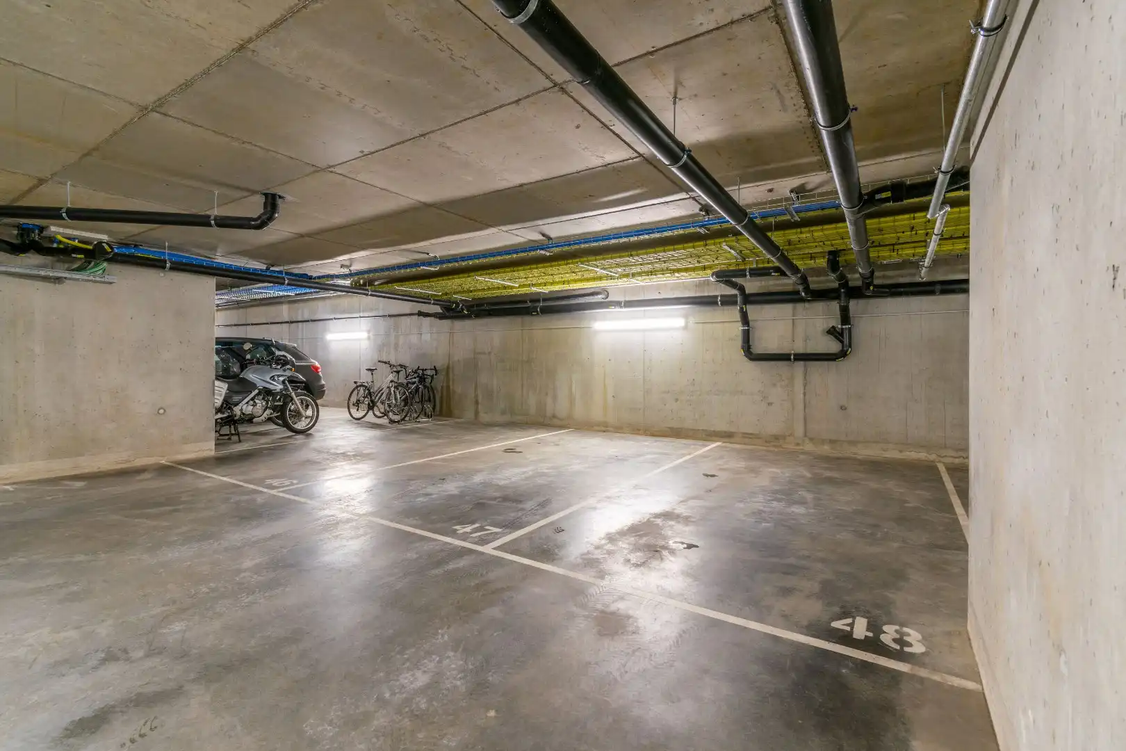 Ondergrondse garagestaanplaats nabij centrum Halle! foto 3