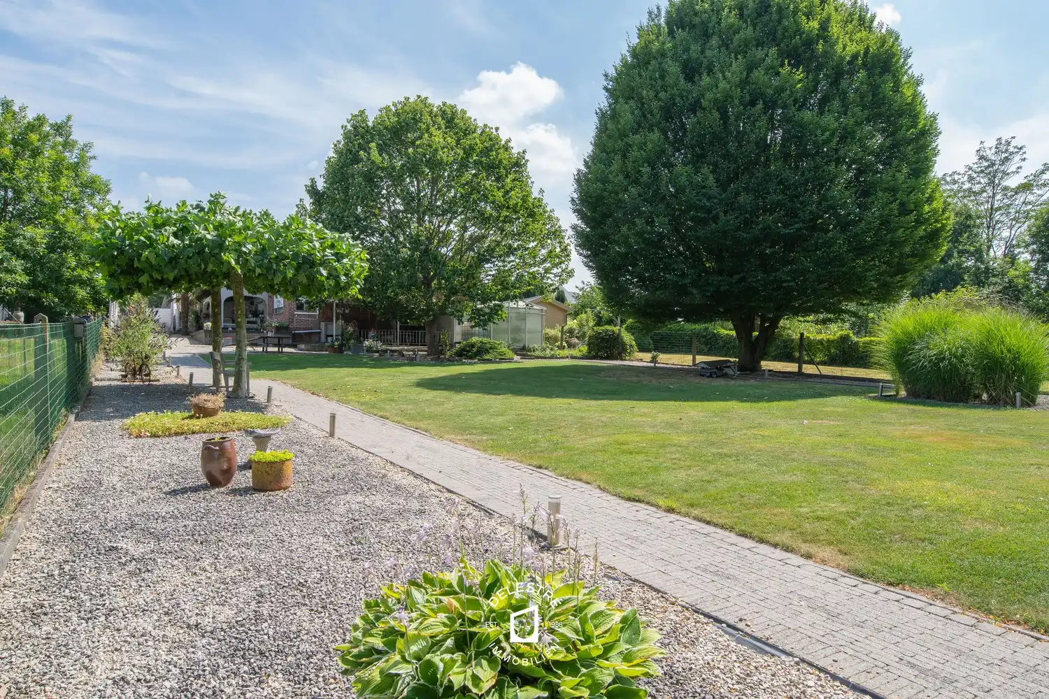 Unieke eigendom met villa, zalige tuin, werkplaats en talrijke mogelijkheden in Okegem foto 5