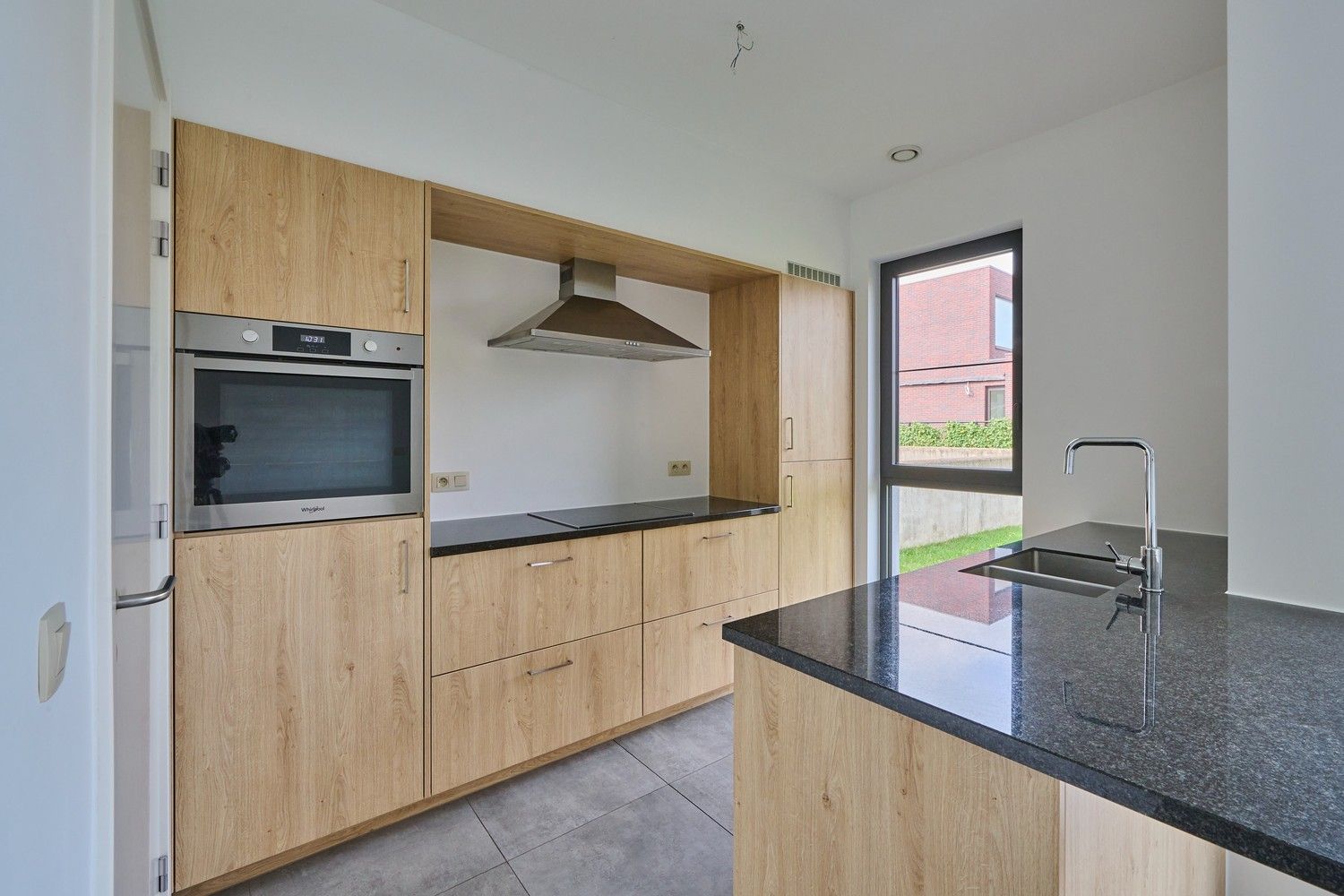 Stijlvol gelijkvloers appartement met zongerichte tuin - EPC 12! foto 3