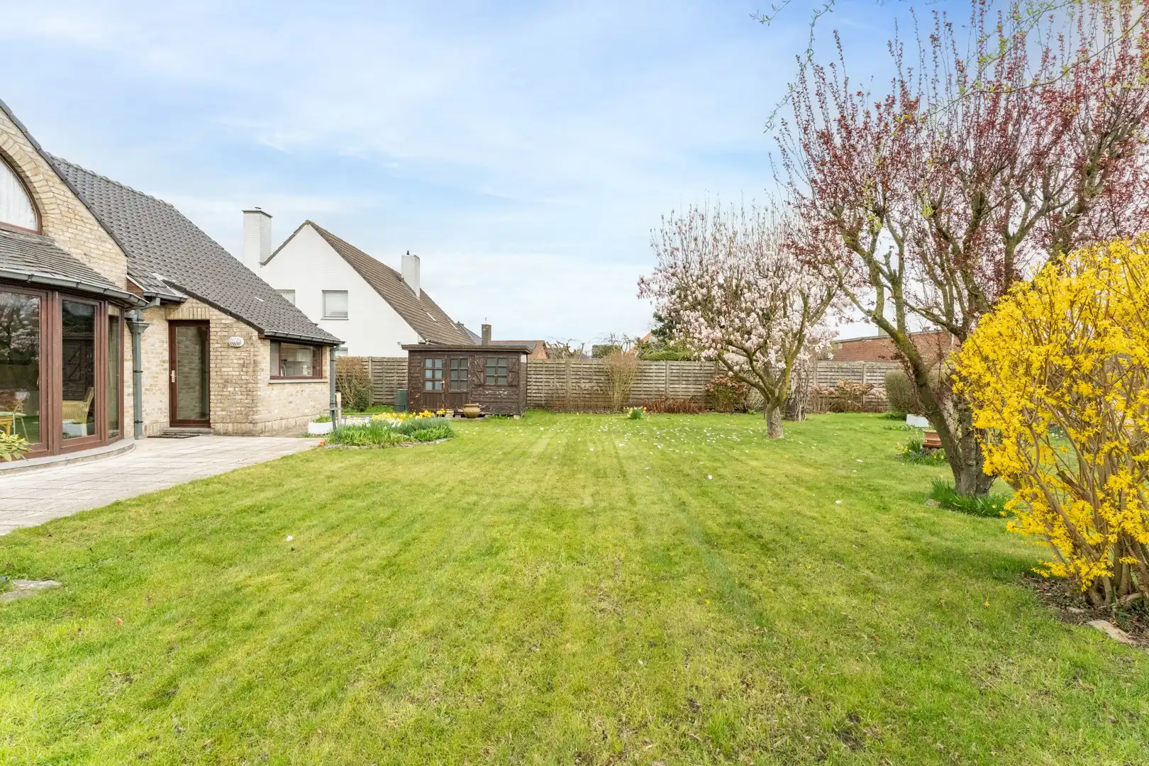 Vrijstaande woning met zonnige tuin en veel potentieel in rustige straat te Wevelgem foto 3