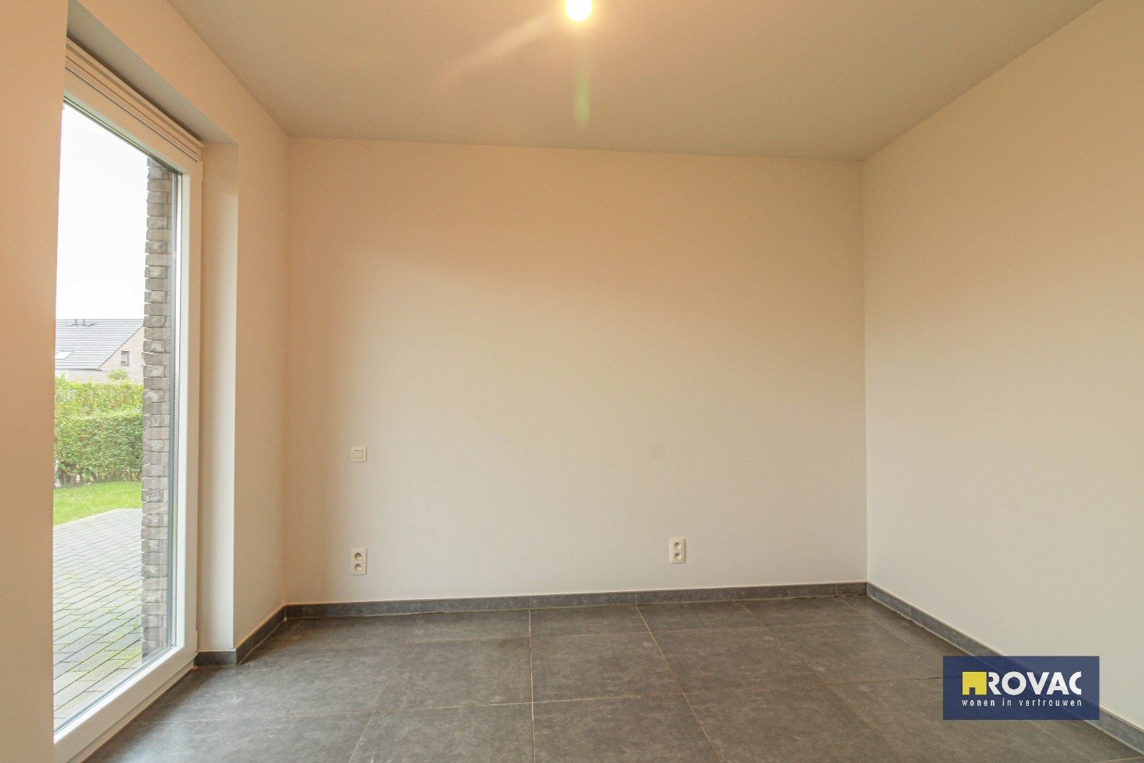 Gelijkvloers appartement met tuin en garage! foto 15