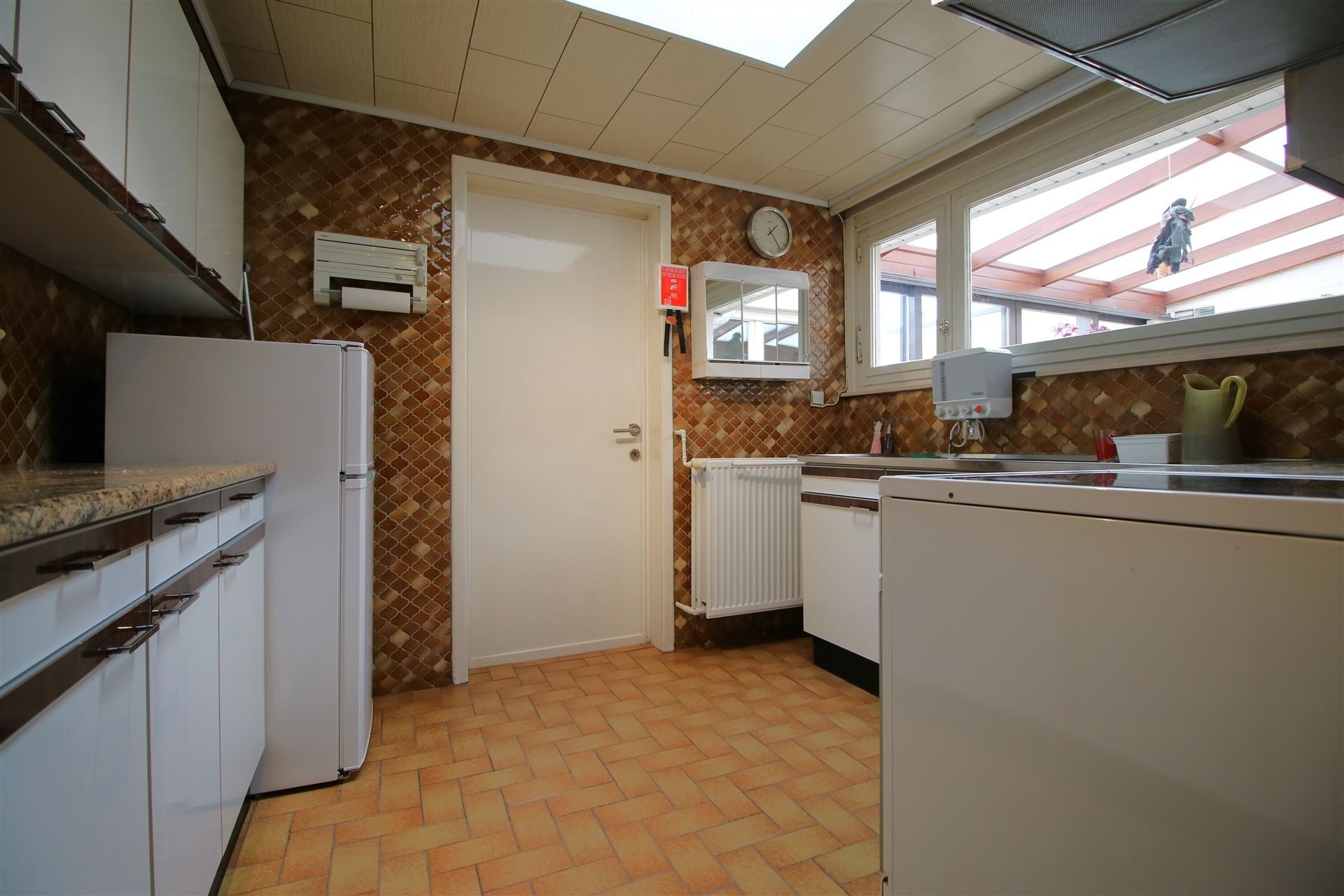Ruime woning met garage, 4 slpk & tuin foto 5