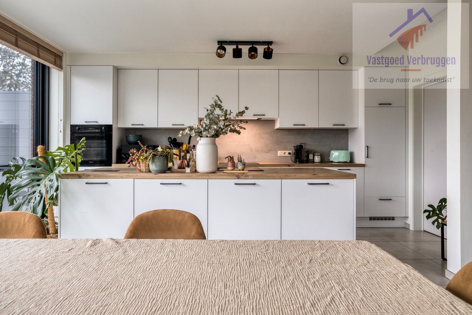 Recent gelijkvloers appartement met terras en tuin foto 6