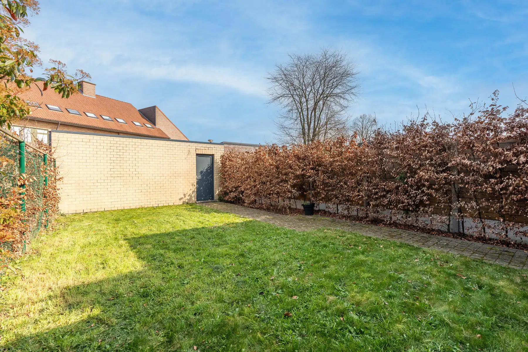 Ruime, energiezuinige woonst met terras, tuin en garage foto 26