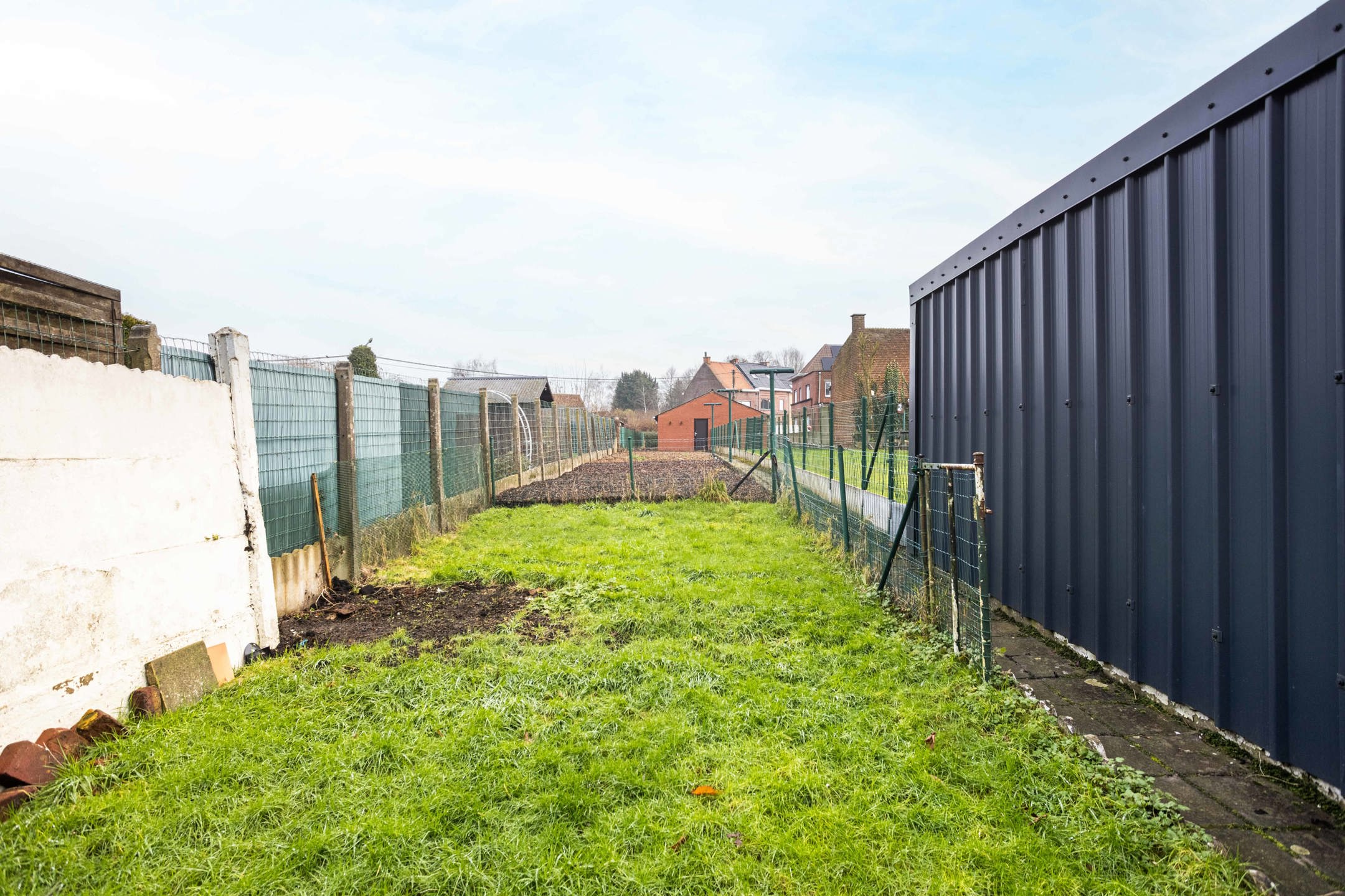 Woning met tuin en achterliggend perceel met oprit & garage! foto 18