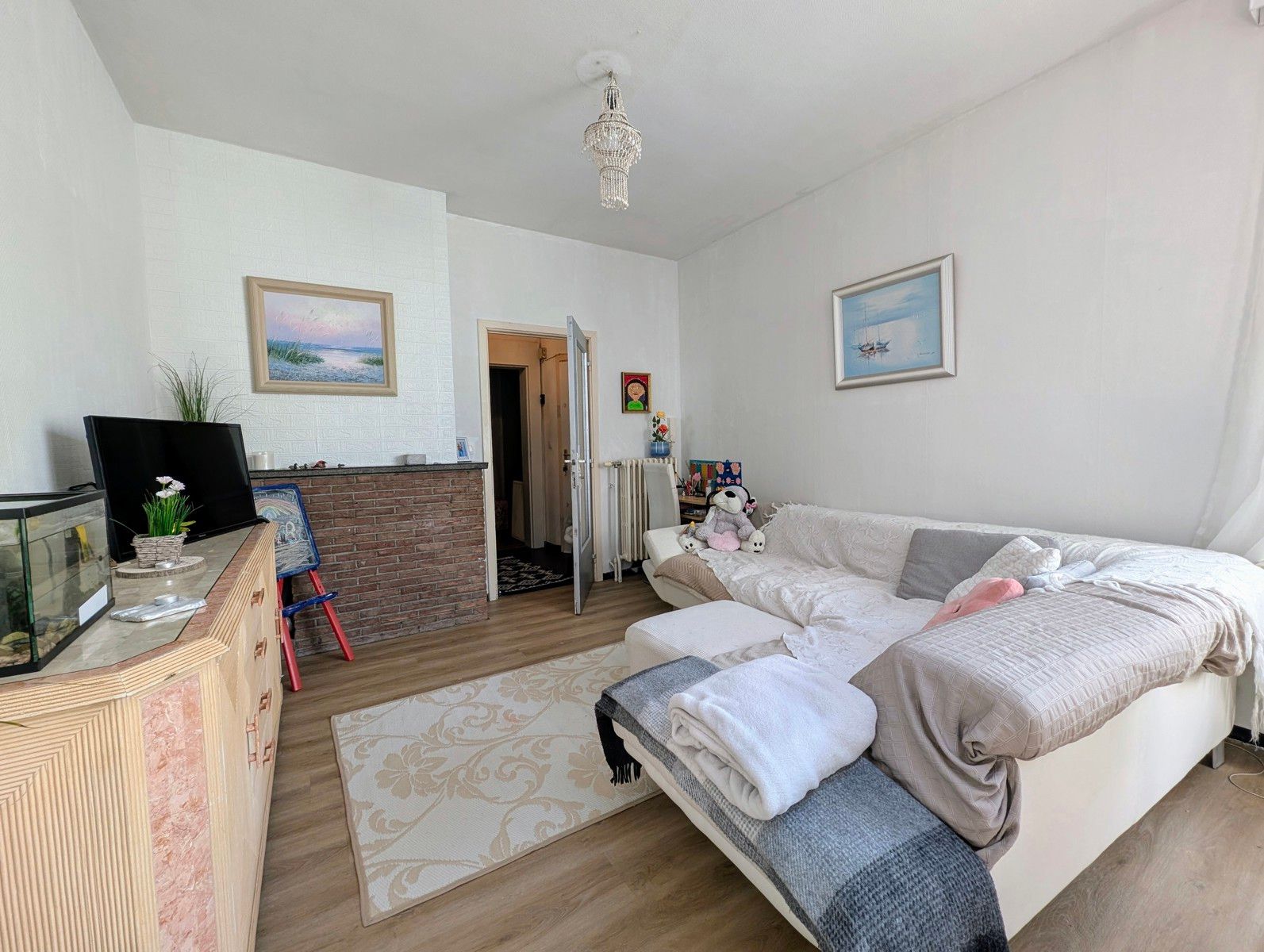 Instapklaar gelijkvloers appartement met 2 slaapkamers & polyvalente ruimte! foto 4