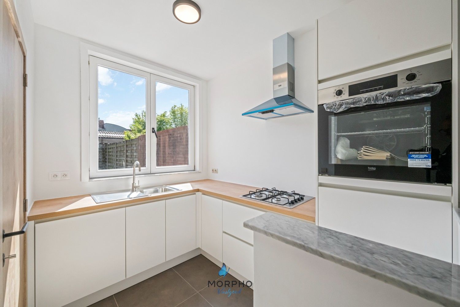 Instapklare stadswoning met tuin en achteruitgang op toplocatie in Sint-Gilliswijk (Brugge) foto 8