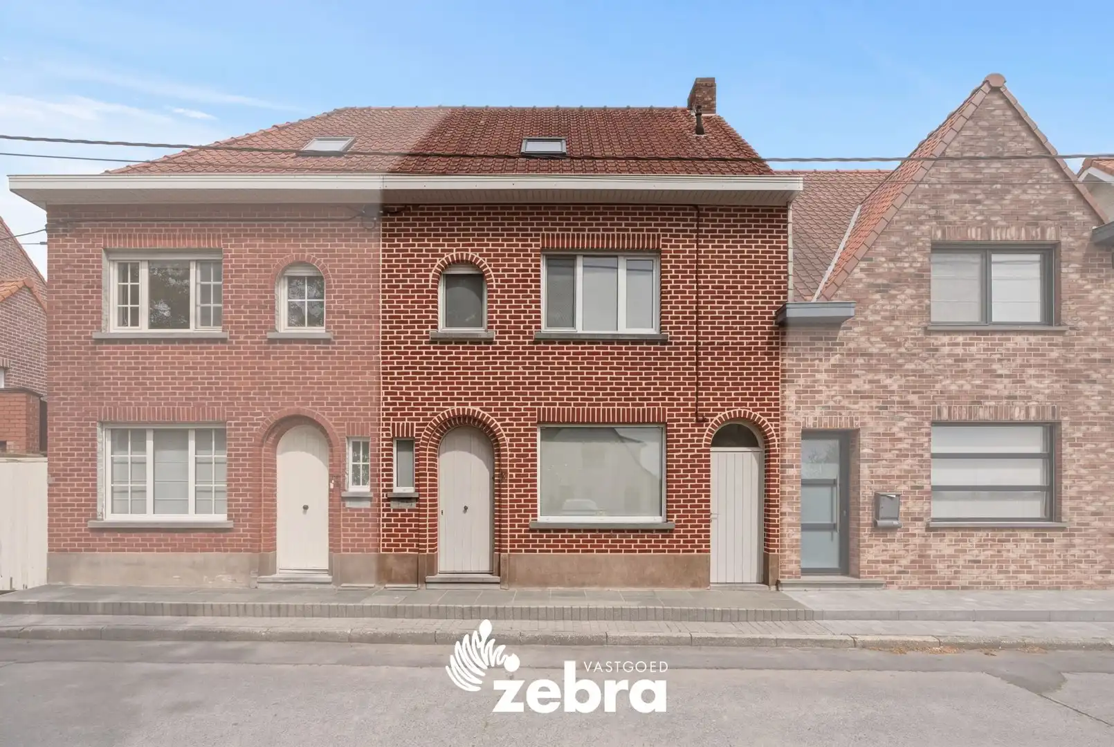 Instapklare gezinswoning met 3 slaapkamers en tuin in Waregem! foto 2