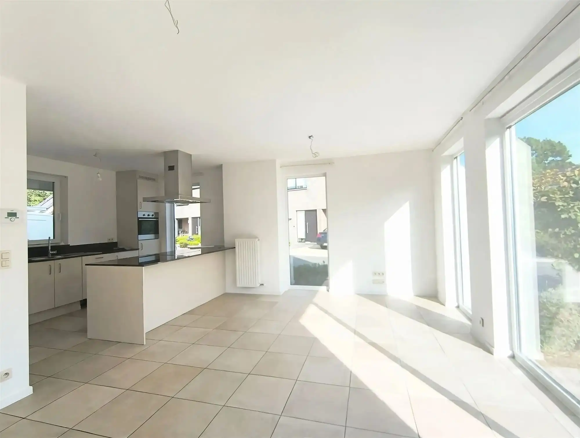 Recente woning met 3 slaapkamers en klein tuintje. In rustige omgeving. foto 4