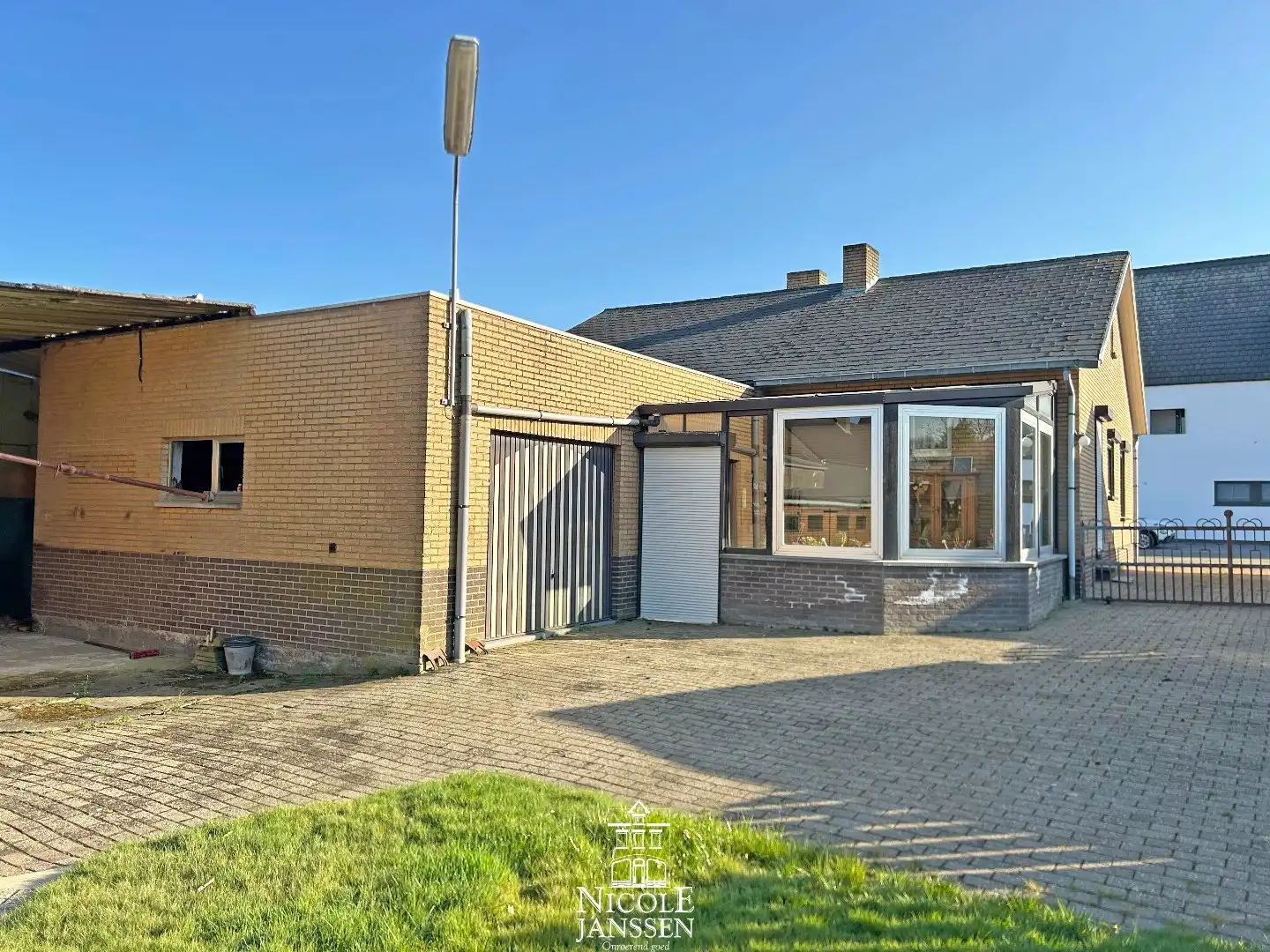 Verzorgde gelijkvloerse woning met tuin in verzorgde straat in centrum van Dilsen foto 19