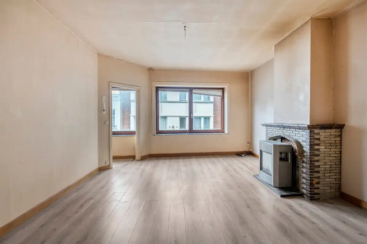 Opbrengsteigendom met renovatiepotentieel op toplocatie in Kortrijk foto 18