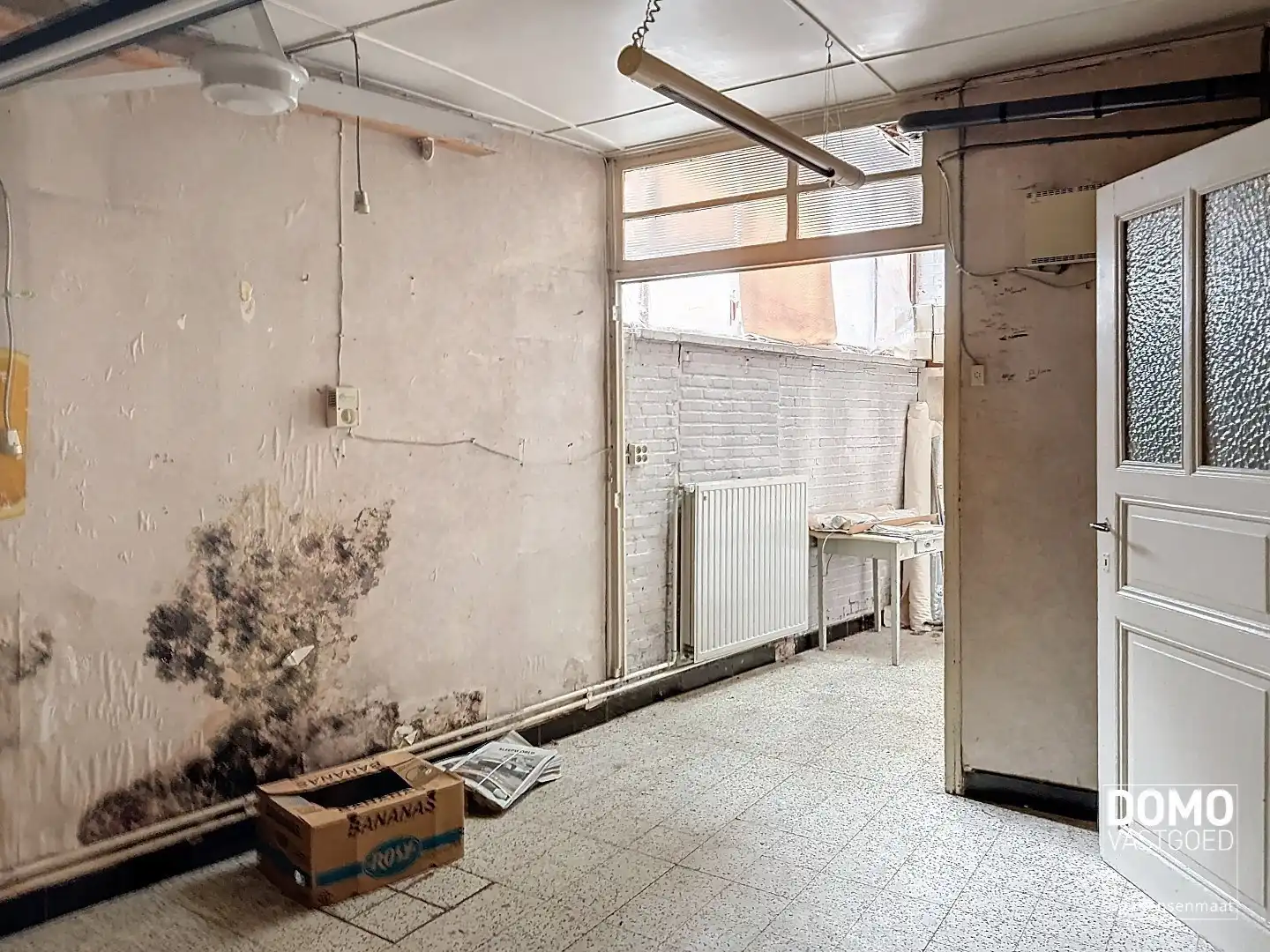 Te renoveren handelshuis gelegen in het centrum van Diepenbeek. foto 14