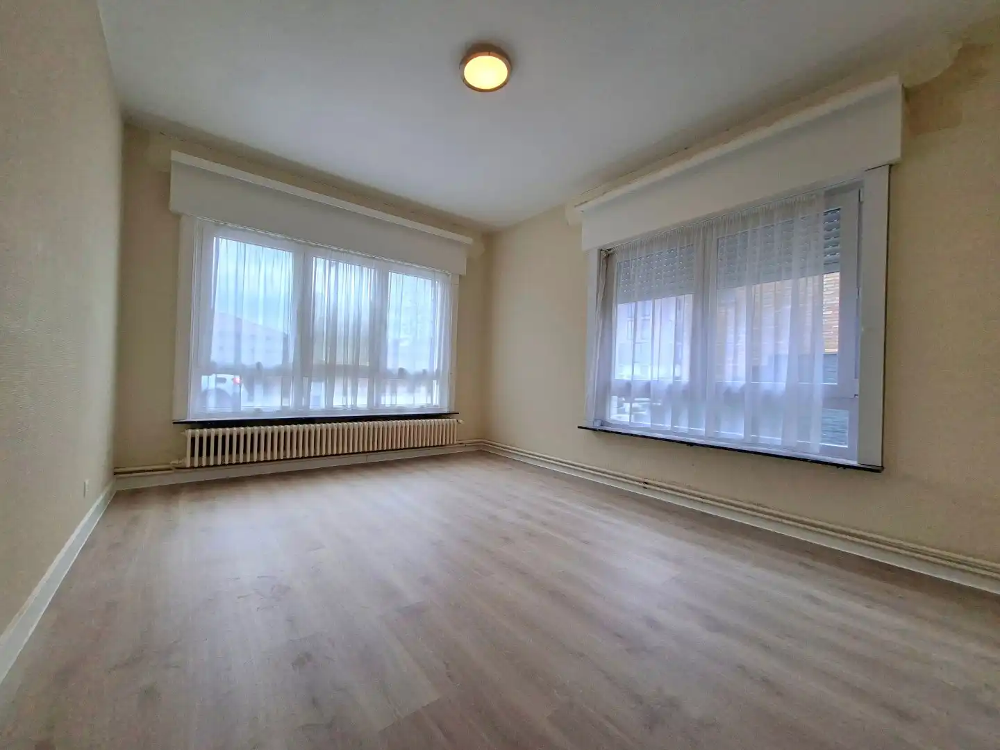 Gelijkvloersappartement met terras en garage foto 9