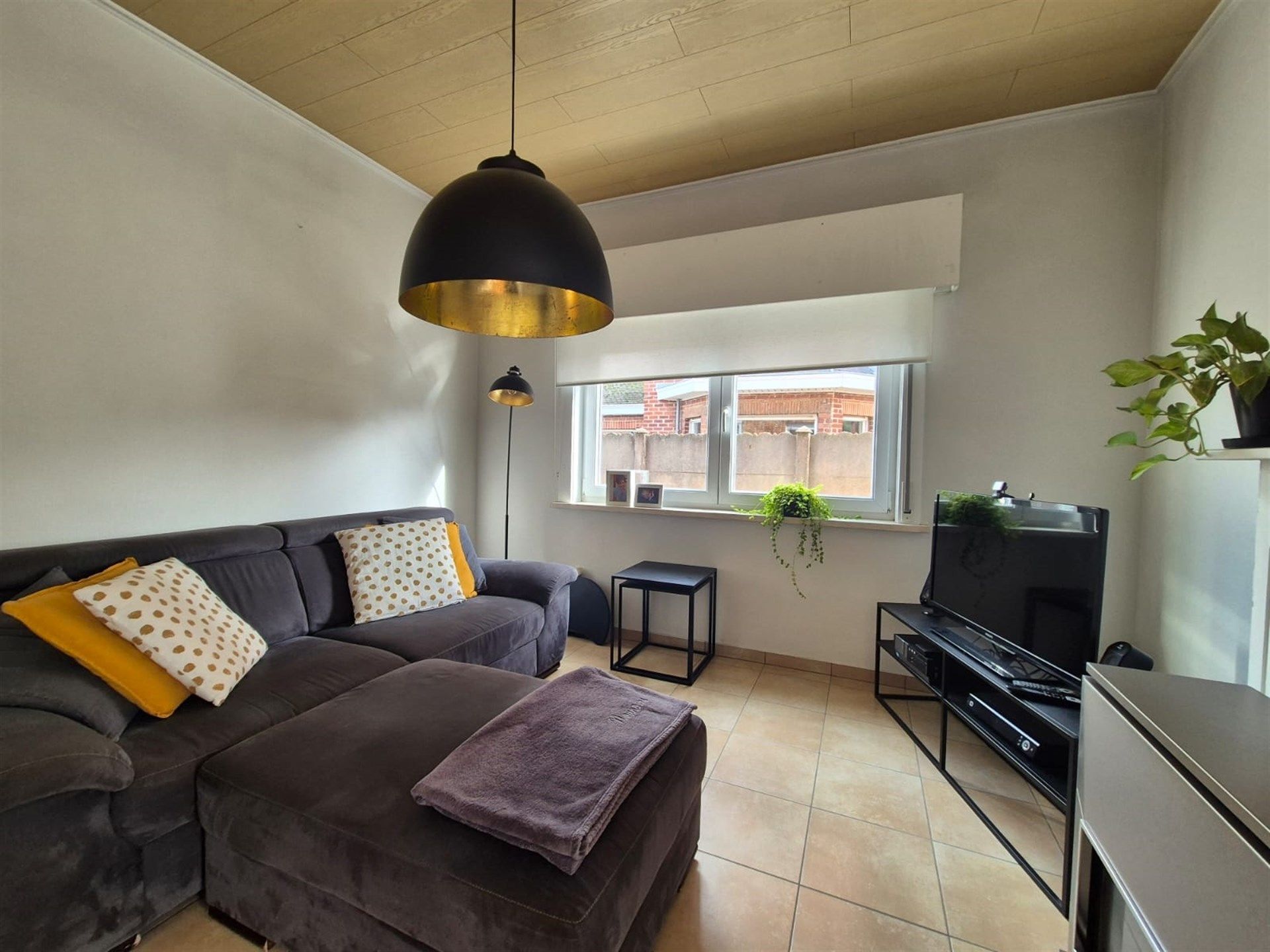 Knusse woning met tuin en garage.  foto 3