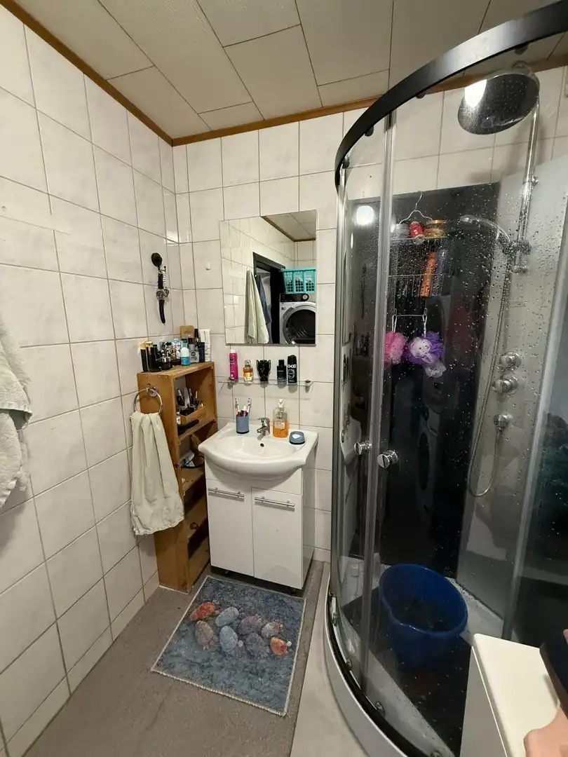 Opbrengsteigendom bestaande uit 2 halfopen woningen met garage en tuin te Hechtel. foto 30