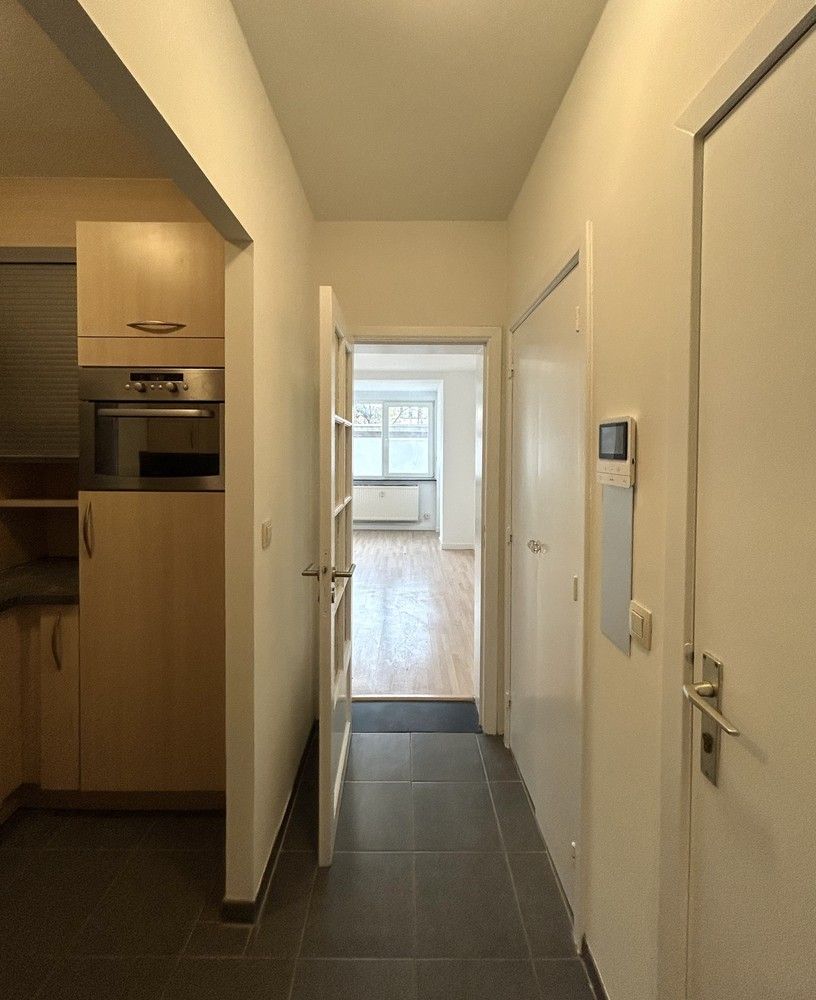 Instapklaar gelijkvloers 1-slaapkamerappartement met ruim terras in Leuven foto 6