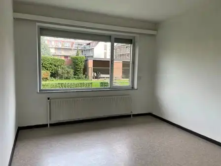 Gelijkvloers 2-slaapkamer appartement met terras en garage foto 5