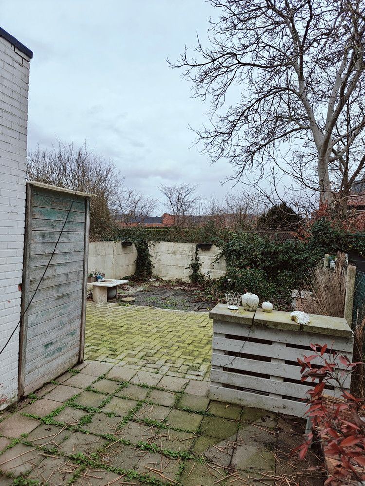 Te renoveren rijwoning met 4 slaapkamers en leuke stadstuin. foto 5