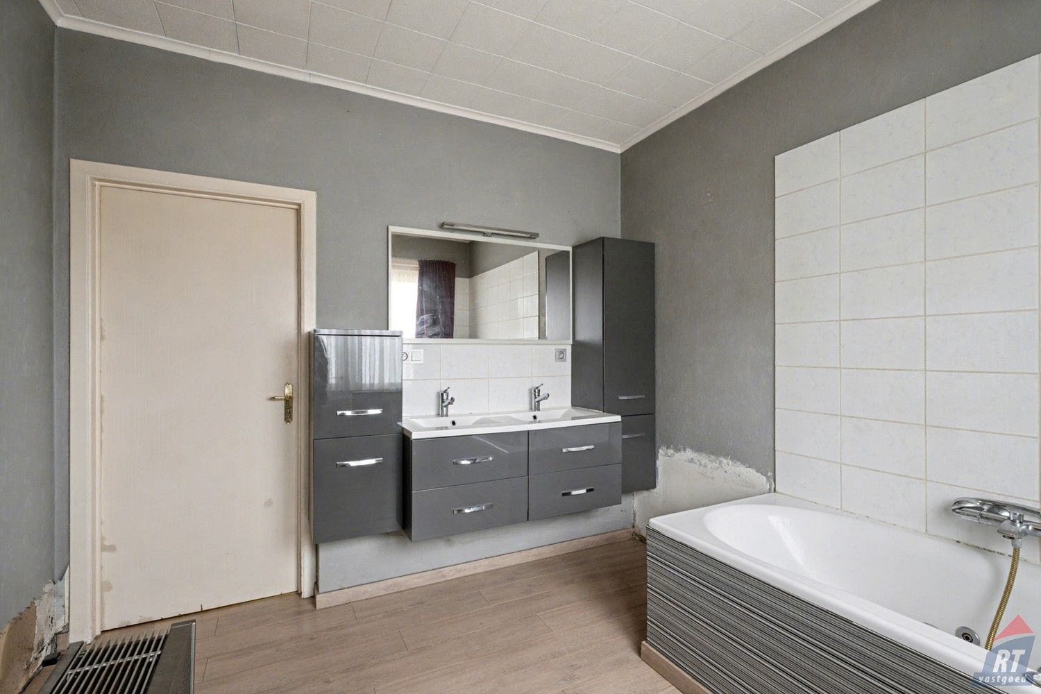 Gelijkvloerse halfopen woning met tuin en renovatiepotentieel in het hart van Sint-Truiden foto 10