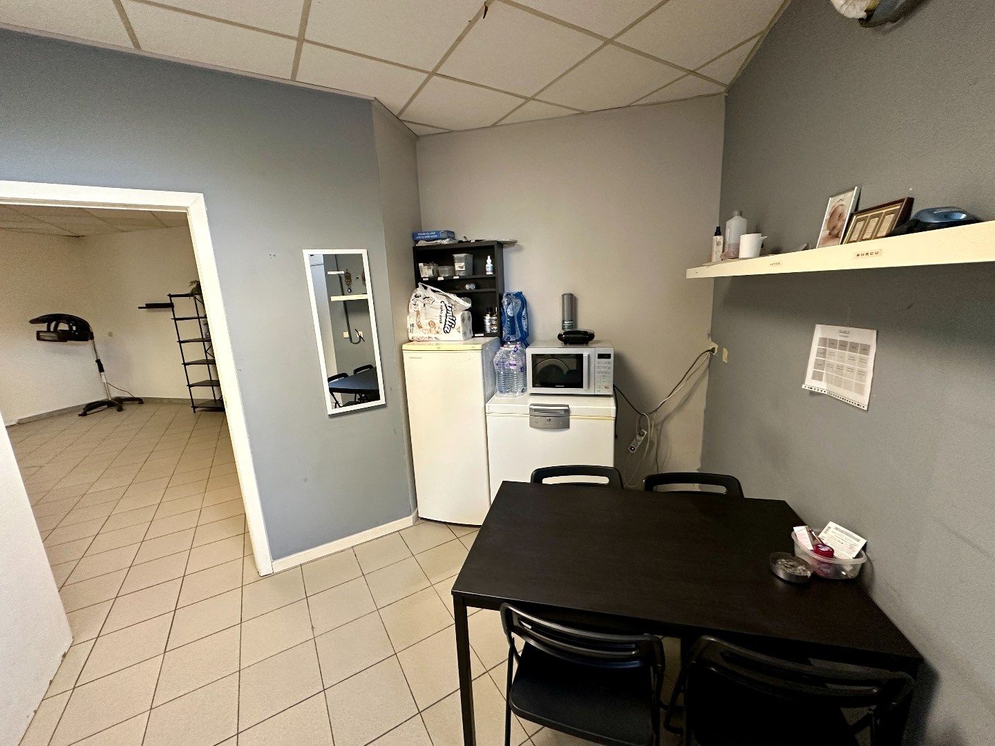 Instapklare winkelruimte van 150m² momenteel ingericht als kapperszaak in Eisden foto 13