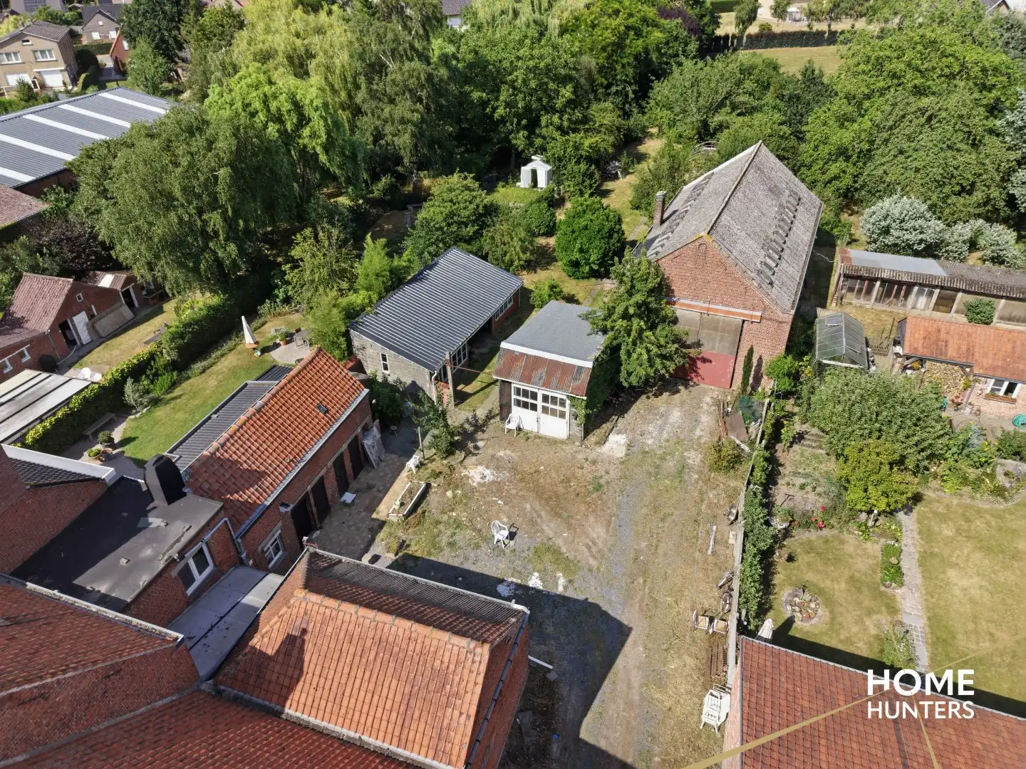 Veelzijdige eigendom met te renoveren woning en twee ruime loodsen in Langemark foto 29