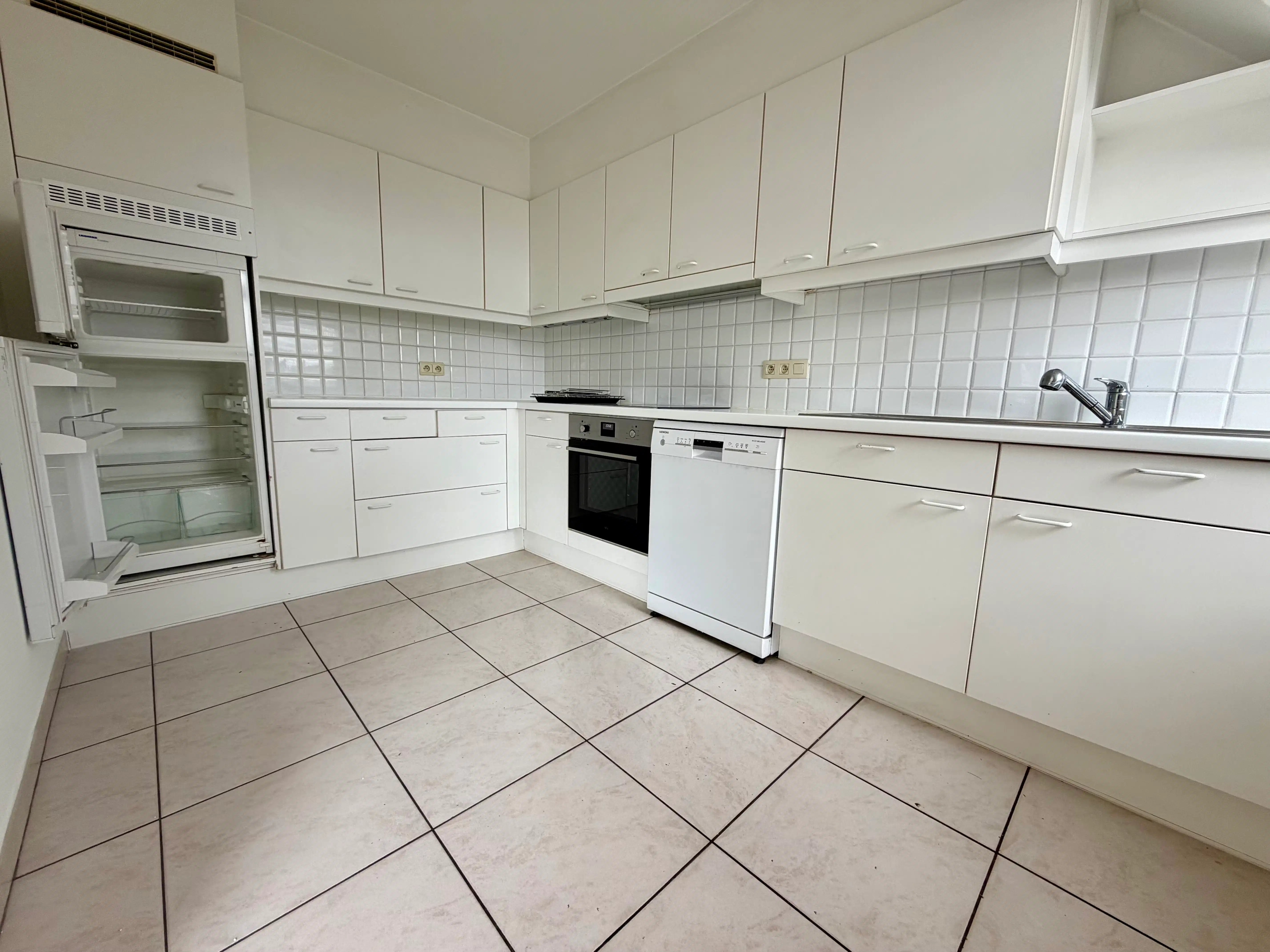 Wonen in het hart van Kortrijk met zicht op het water foto 3
