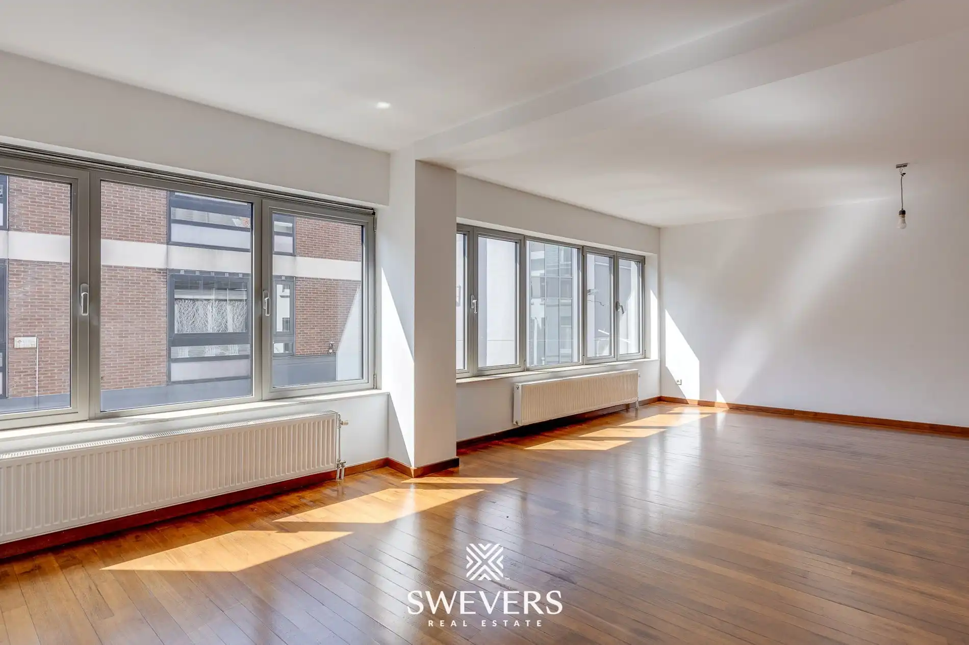 Ruim duplex-appartement in hartje Hasselt: ideaal voor 3 studenten of om te co-housen foto 3