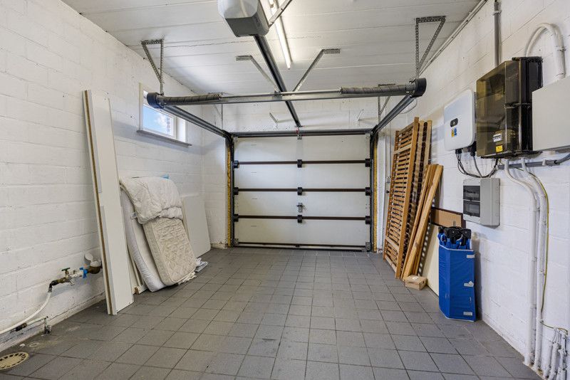 Luxueuze en instapklare woning met garages en tuin foto 12