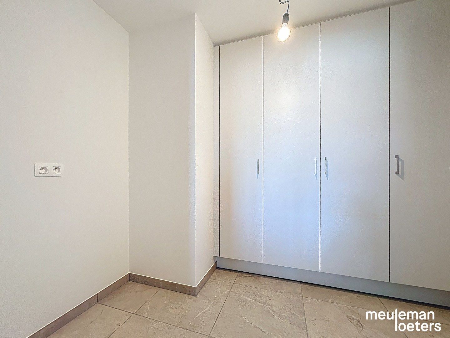 Ruim nieuwbouwappartement met garage foto 8