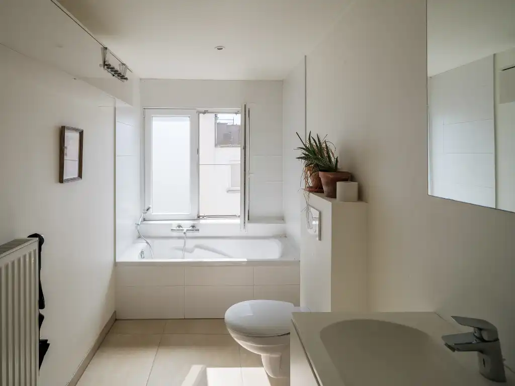 Hoekwoning met aangenaam volumespel, 3 slaapkamers, aparte fietsenberging en twee zongerichte terrassen, gelegen in de omgeving van Portus Ganda. foto 14