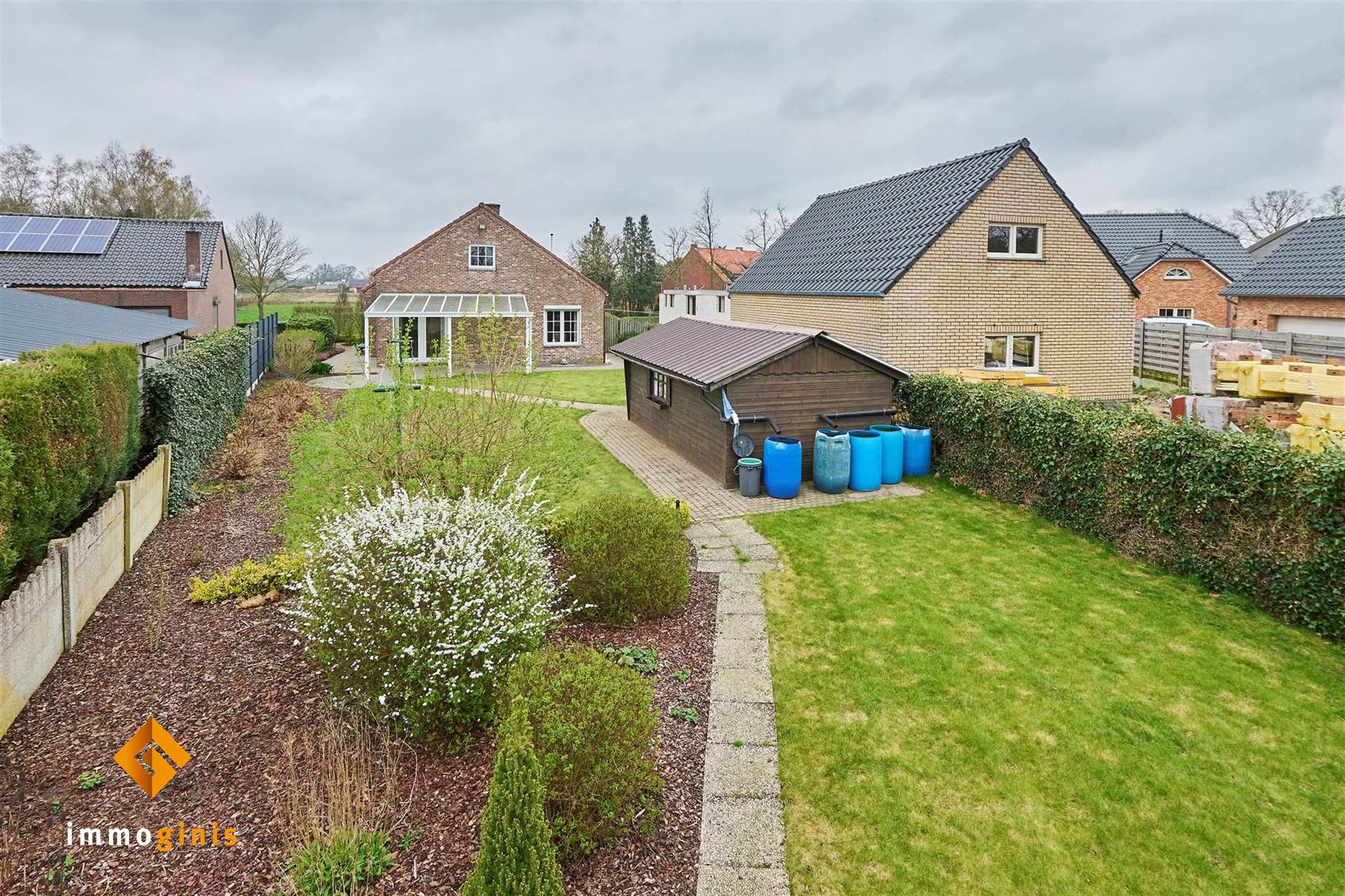 Zeer goed onderhouden woning met 2 slpks (+ mog. tot 2 à 3 extra kamers), overdekt terras en mooie tuin! foto 14