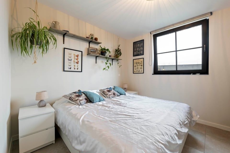 PRACHTIG NIEUWBOUWAPPARTEMENT MET 2 SLKS EN EEN STAANPLAATS IN HET LANDELIJKE HEERS foto 14