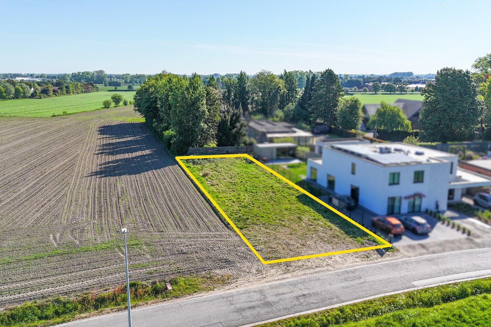 Bouwgrond voor open bebouwing in landelijke omgeving te Roksem (684 m²) foto 3