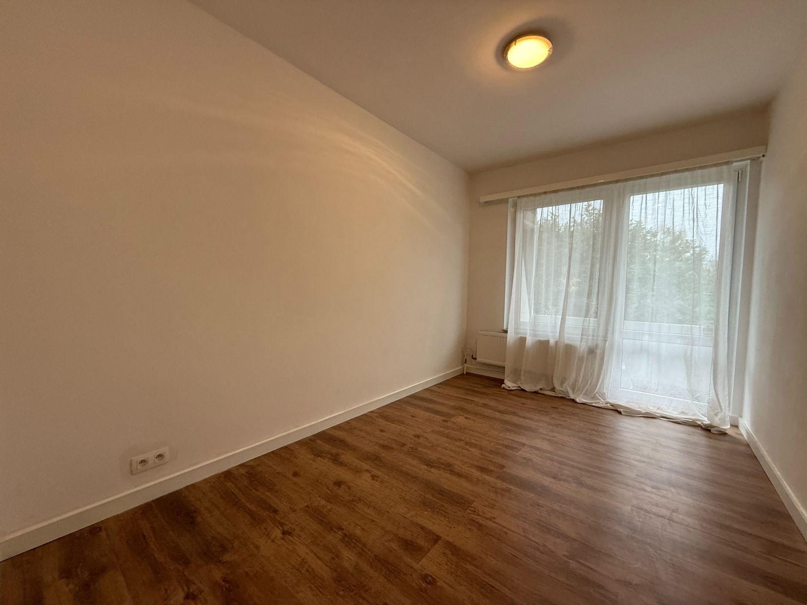 Appartement met twee slaapkamers in het hart van Drogenbos foto 11