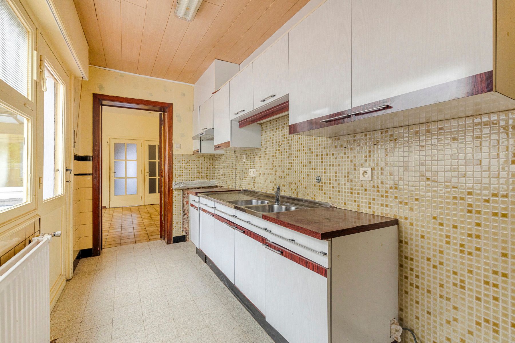 Centraal gelegen rijwoning met 4 slaapkamers foto 8