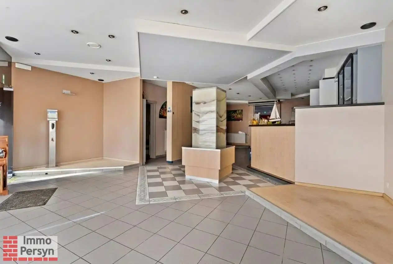 Veelzijdig handelspand met bovenliggende woonst en studio op centrale ligging in Begijnendijk foto 4