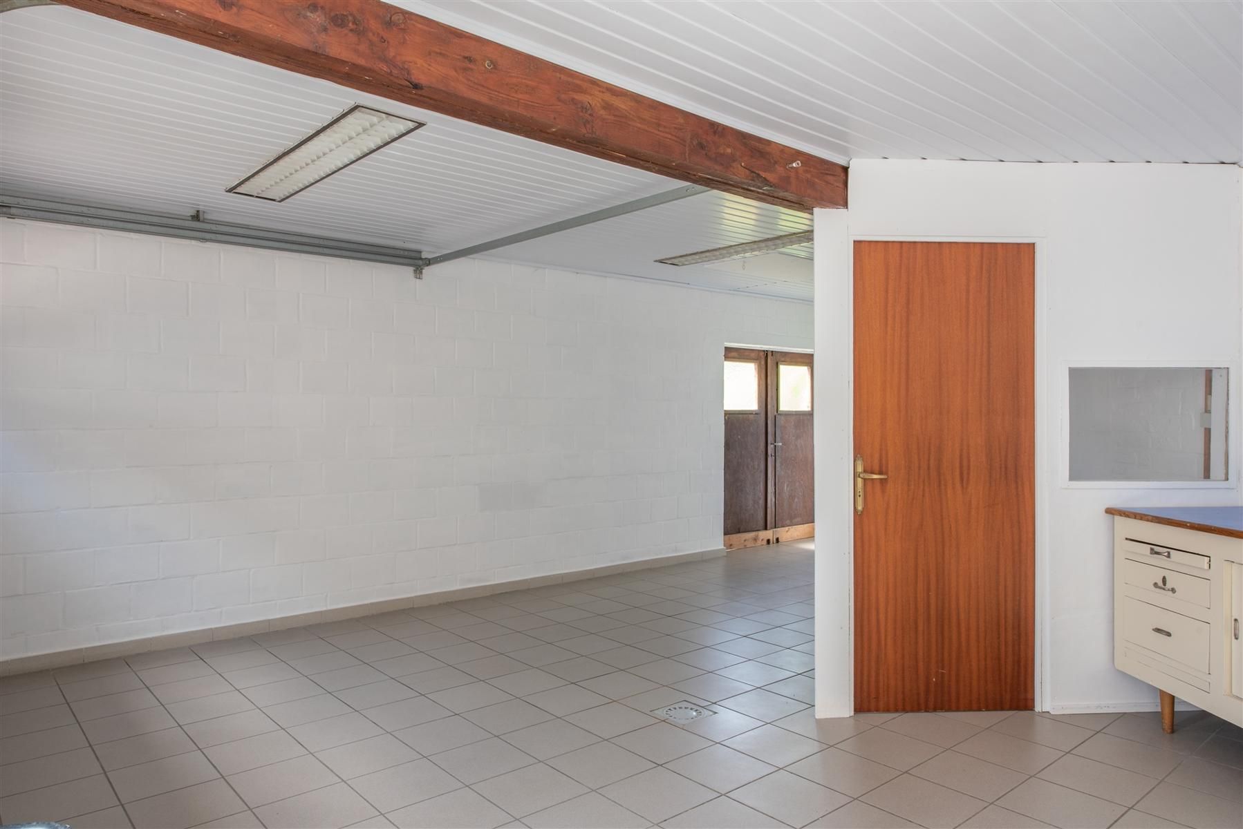 Gelijkvloersappartement met garage foto 14